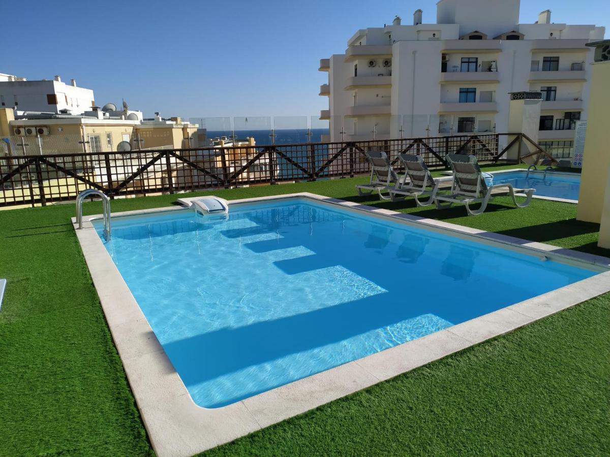 Ocean Breeze - Terrace Pools Apartment อาร์มาซอง เด เปรา ภายนอก รูปภาพ